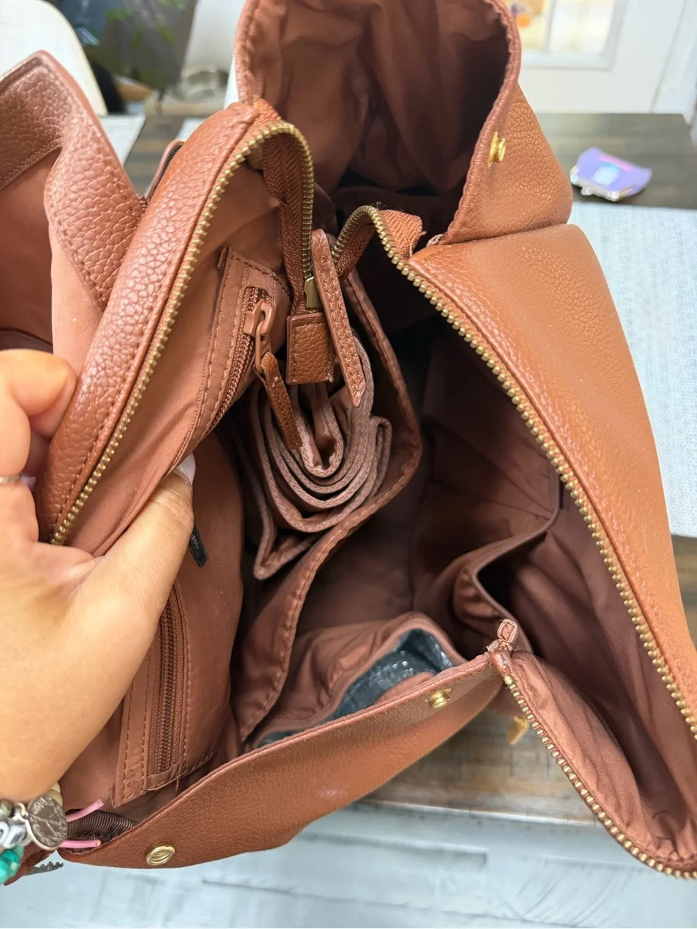 Freshly Picked Brown Leather-Textured Backpack with Gold Logo